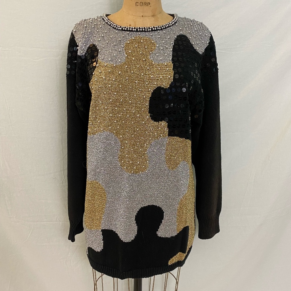 Black sweater with metallic silver and gold puzzle pieces. Vintage Ugly Sweater.